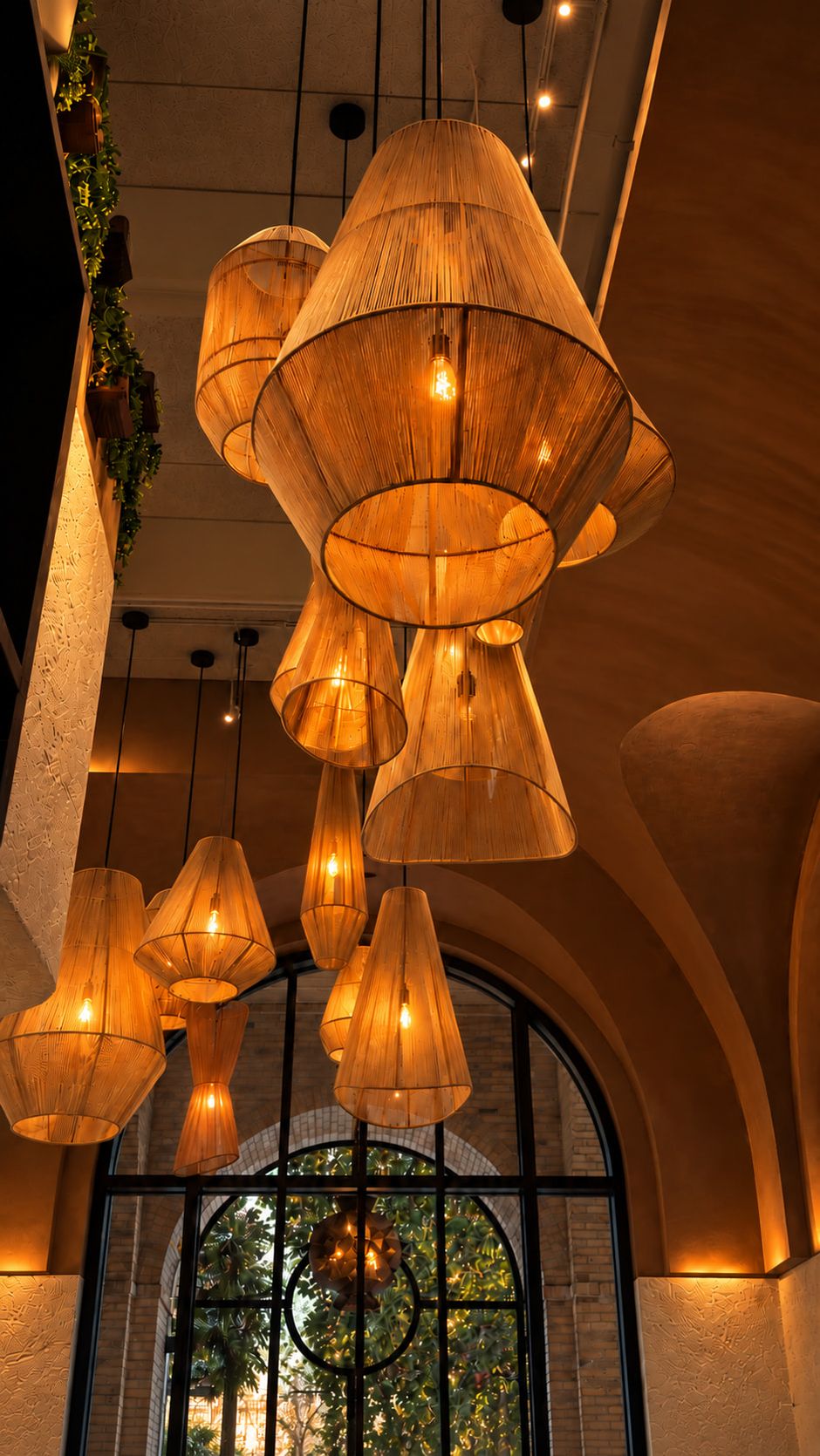 Woven lanterns hanging over the dining room